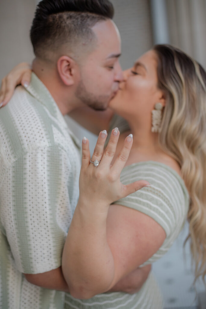 Fort Myers Engagement session: Couples having fun. Showing off the ring.