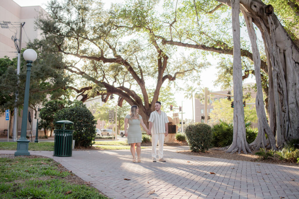 Fort Myers Engagement session: Couple is walking.