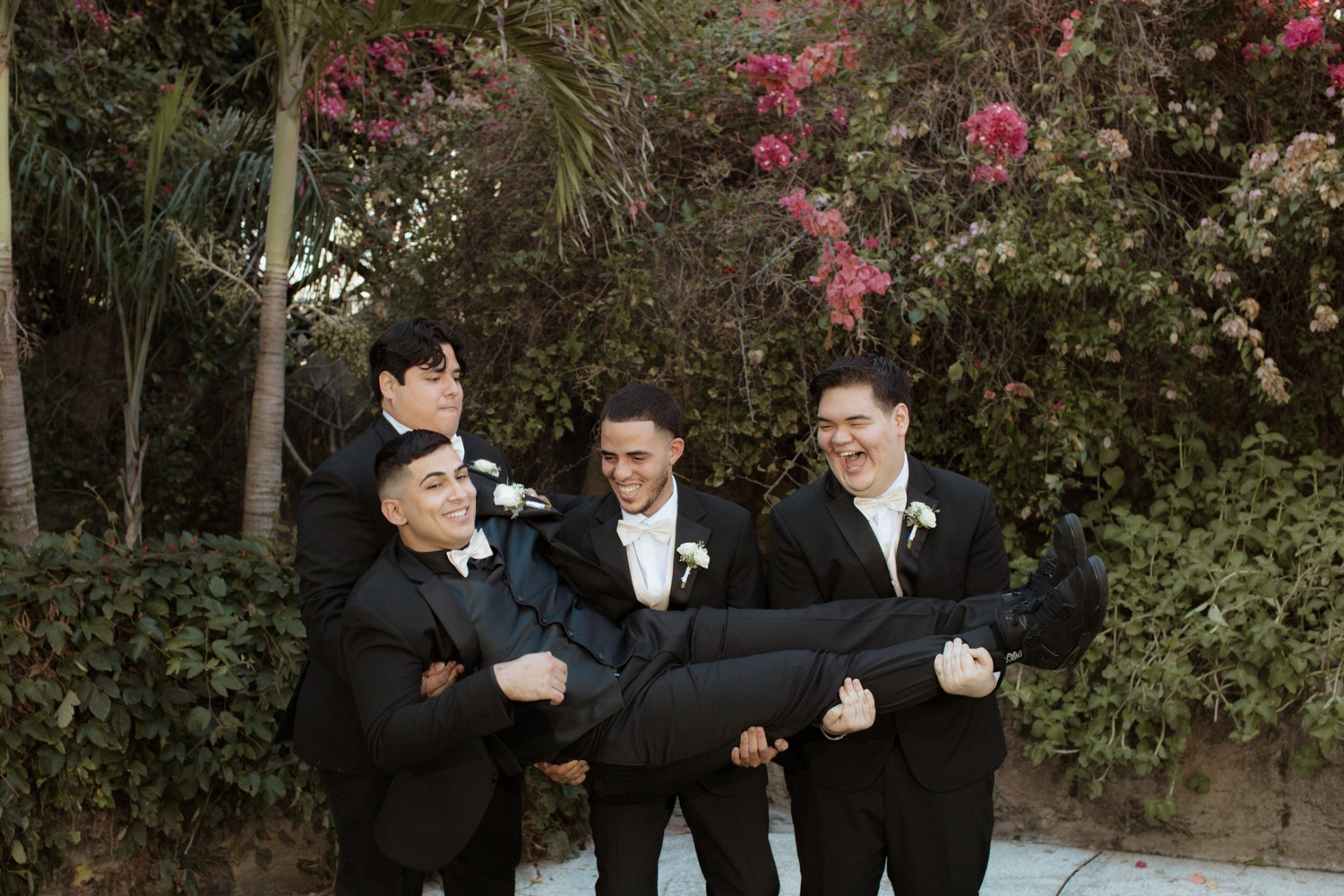 The Groom having fun with his best men and friends