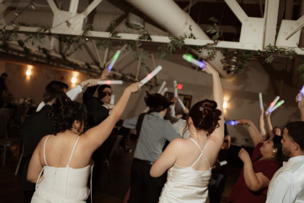 This image is of a Bride and Groom having fun at their reception.