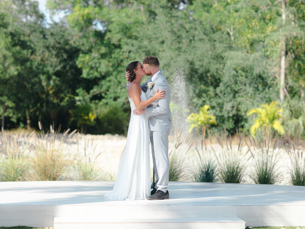 First Kiss at Corkscrew Weddings and Winery in Estero, Florida